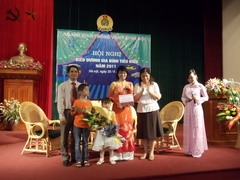 The conference praised the &quotExcellent and Typical Family" of Hanoi...